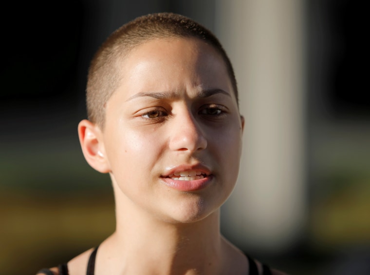 Image: Emma Gonzalez, a senior at Marjory Stoneman Douglas High School, speaks to the media after calling for more gun control at a rally