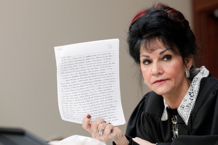 Image: Judge Rosemarie Aquilina holds a letter written by Larry Nassar