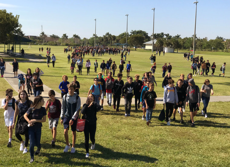 Image: Students from West Lakes Middle School and Marjory Stoneman Douglas High School walkout during a to protest gun violence