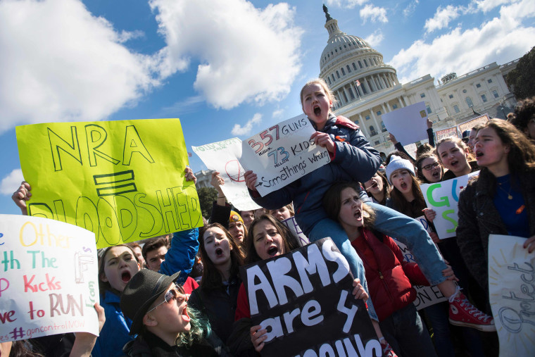 Image: Students rally during a walkout against gun violence on Capitol Hill
