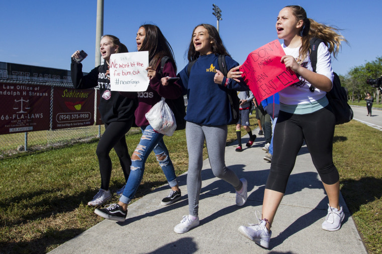 Image: Students from Westglades Middle School walk out of class