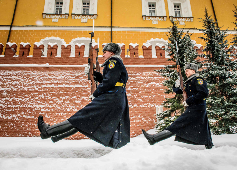 Image: Guards march during the changing of the guards ceremony at the Tomb of the Unknown Soldier