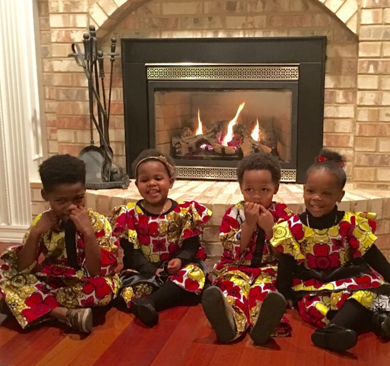 Sheinelle Jones's 8-year-old son and 5-year-old twins, pictured here with their cousin, wear traditional African native clothing for their family Christmas celebrations.