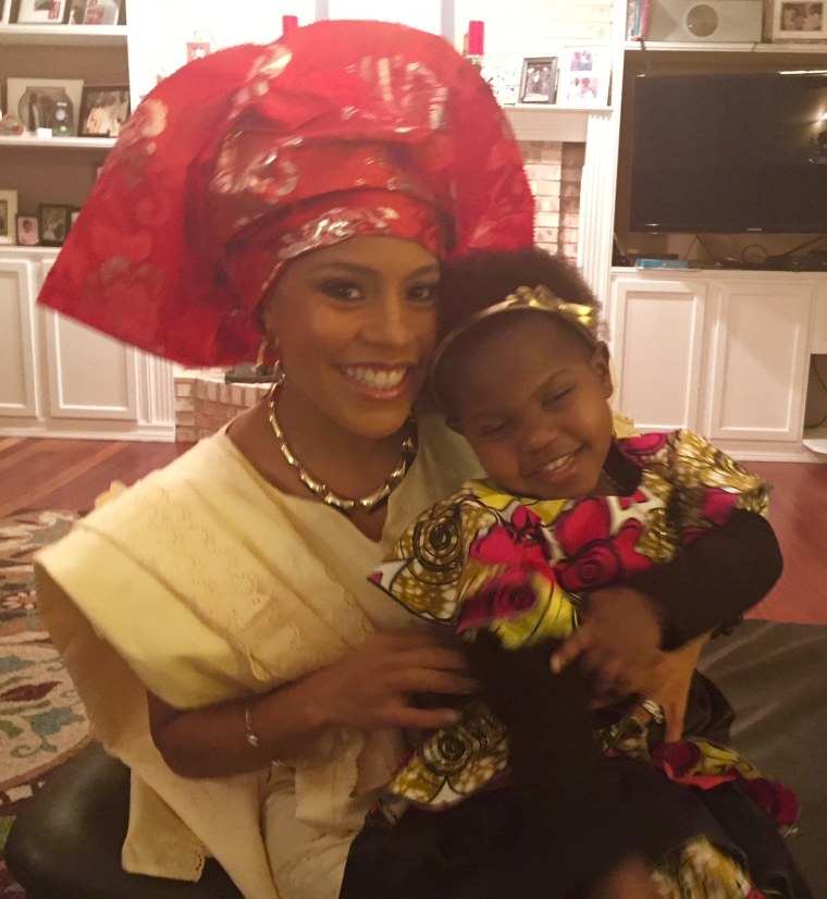 TODAY's weekend co-anchor Sheinelle Jones (pictured here in traditional African native clothing with her daughter) said when she saw "Black Panther," "I loved it so much, I couldn't wait to take my 8-year-old son. I wanted him to see a superhero who not only looked just like him, but was in touch with his humanity, honored his elders, made good decisions and treated the women in his life with so much respect and admiration. I knew he would love it."