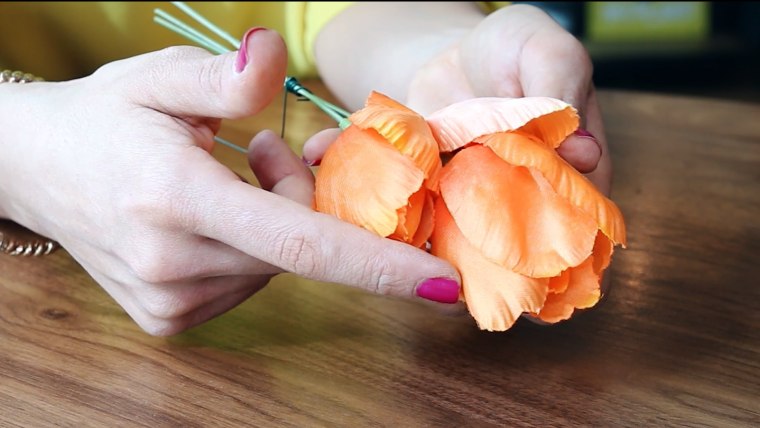 Artificial flowers will ensure the display lasts.