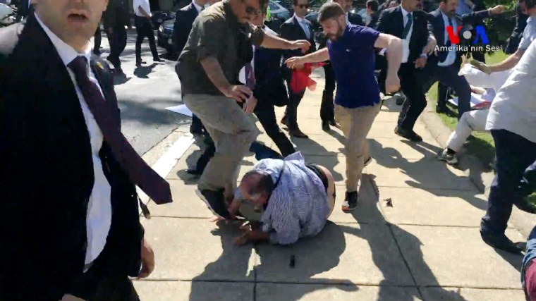 Image: Violent clashes broke out between protesters and supporters of Turkey's President Tayyip Erdogan