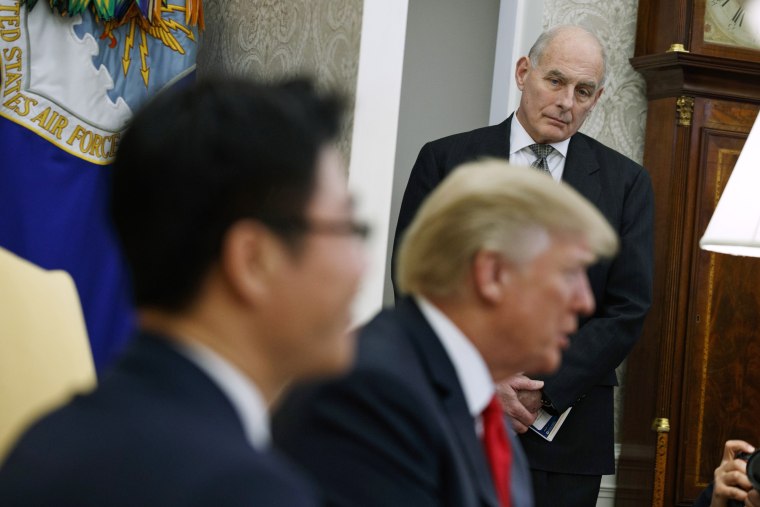 Image: White House Chief of Staff John Kelly listens during a meeting