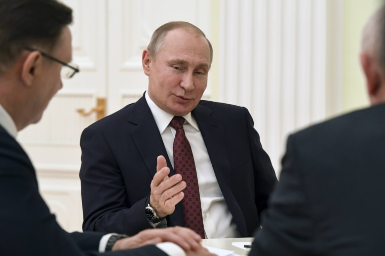 Image: Russian President Putin meets with co-chairs of his campaign office at the Kremlin in Moscow