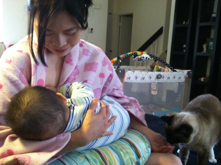 Image: To-wen Tseng nursing her first child, then 6 months old, at home after leaving her full-time job in 2013
