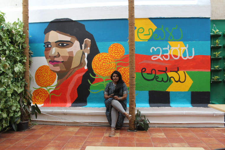 Poornima Sukumar with a finished mural in Bangalore, India, in March 2018.