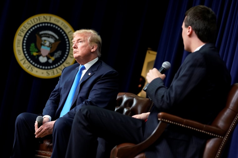 Image: Trump participates in an onstage interview during a youth forum at the White House in Washington