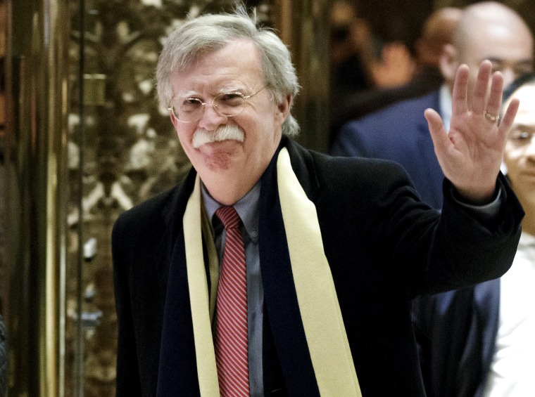 Image: John Bolton waves following a meeting with U.S. President-elect Donald Trump at Trump Towe
