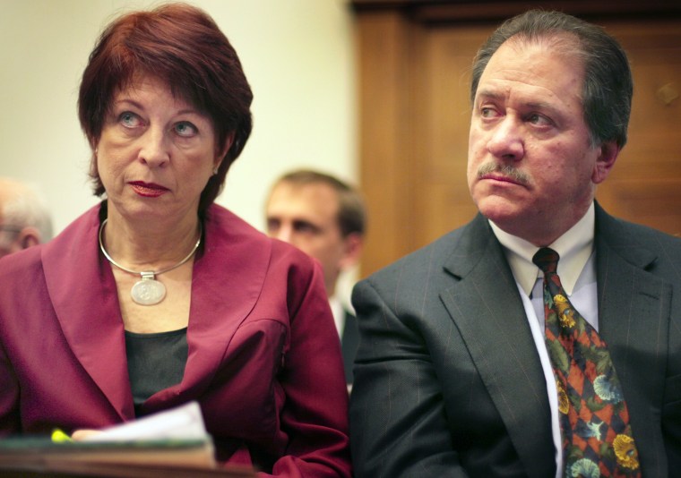 Image: Victoria Toensing and Joe diGenova listen to former CIA agent Valerie Plame Wilson testify