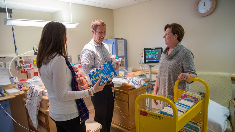 Kara and Brad Curran worried how they would bond with their twin sons while they were in the neonatal intensive care unit. But a gift of a book helped make it easier.