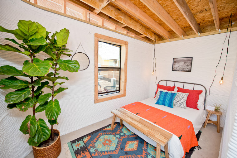 Image: A bedroom inside a home made with a giant 3D printer