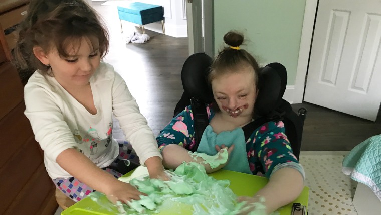 Despite having numerous health conditions and physical deformities, Sophia remains happy and sweet. She loves playing with her sister Lyla.