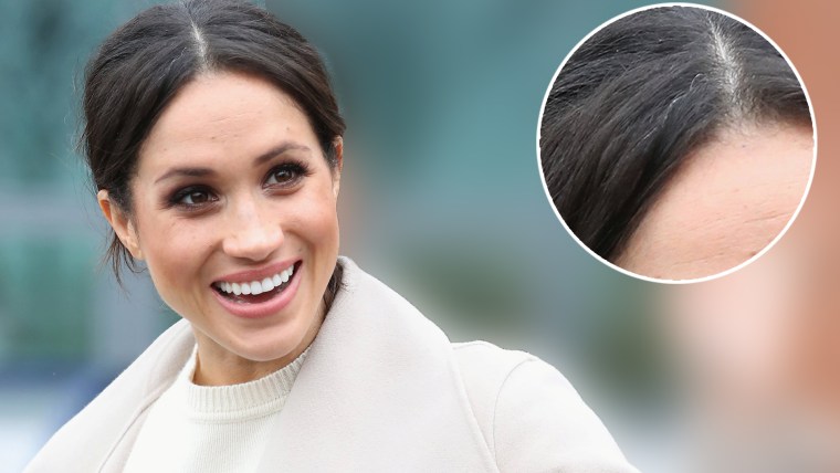 Image: The fiancee of Britain's Prince Harry, Meghan Markle, reacts after a visit to a science park called Catalyst Inc., in Belfast