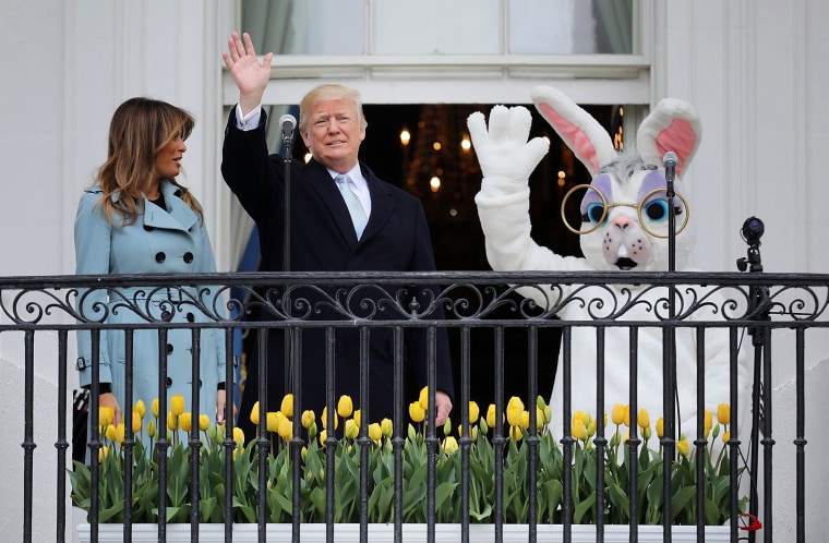 Image: President Donald Trump and first lady Melania Trump greet the crowd from the Truman Balcony during the annual White House Easter Egg Roll on April 2.