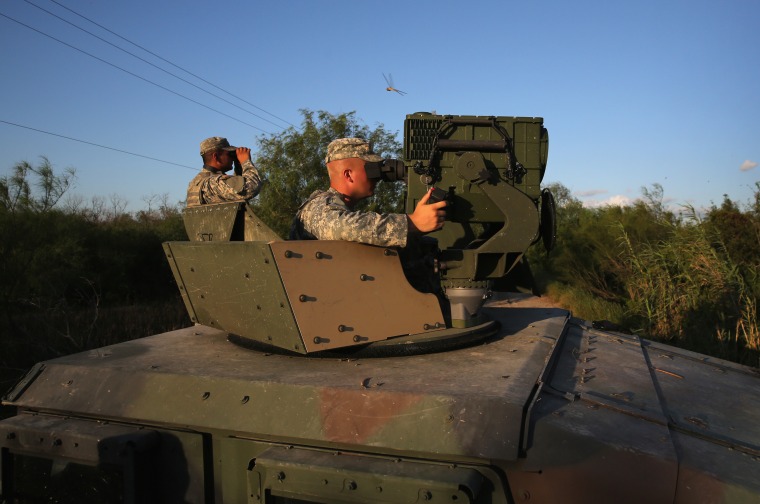 Image: Texas National Guard soldiers monitor the U.S.-Mexico border