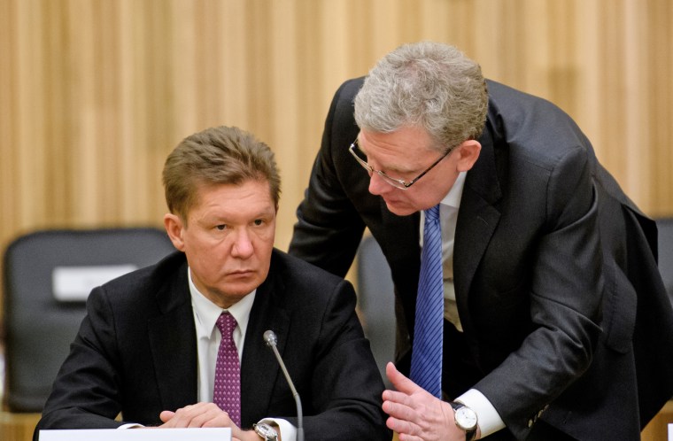 Alexei Miller, left, chairman of the management board of Gazprom, talks with Alexei Kudrin, chairman of the board for the Center for Strategic Research, in 2017. Miller is one of those targeted in the Trump administration's sanctions announced Friday.