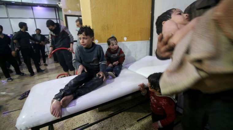 Image: Syrian kids wait to receive medical treatment after Assad regime forces allegedly conducted a poisonous gas attack on Duma, Eastern Ghouta in Damascus, Syria on April 07, 2018.