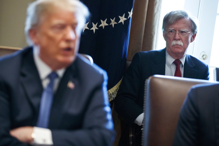 Image: Bolton listens as President Donald Trump speaks