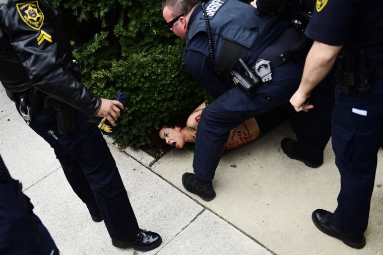 Image: Protester outside Bill Cosby trial