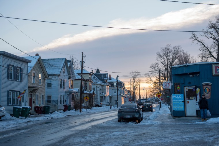 Image: The sun rises over Branch Street in Lowell
