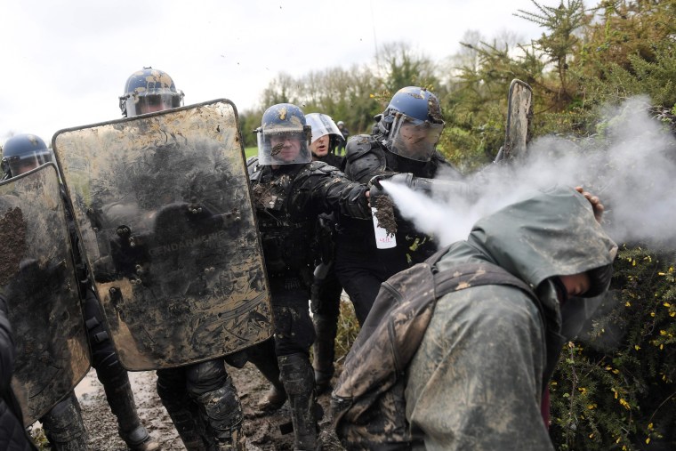 Image: French police clash with protesters