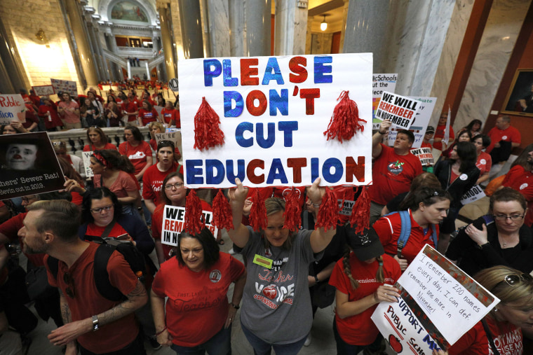 Image: Kentucky Public school teachers protest outside the Kentucky House Chamber as they rally for a \"day of action\"