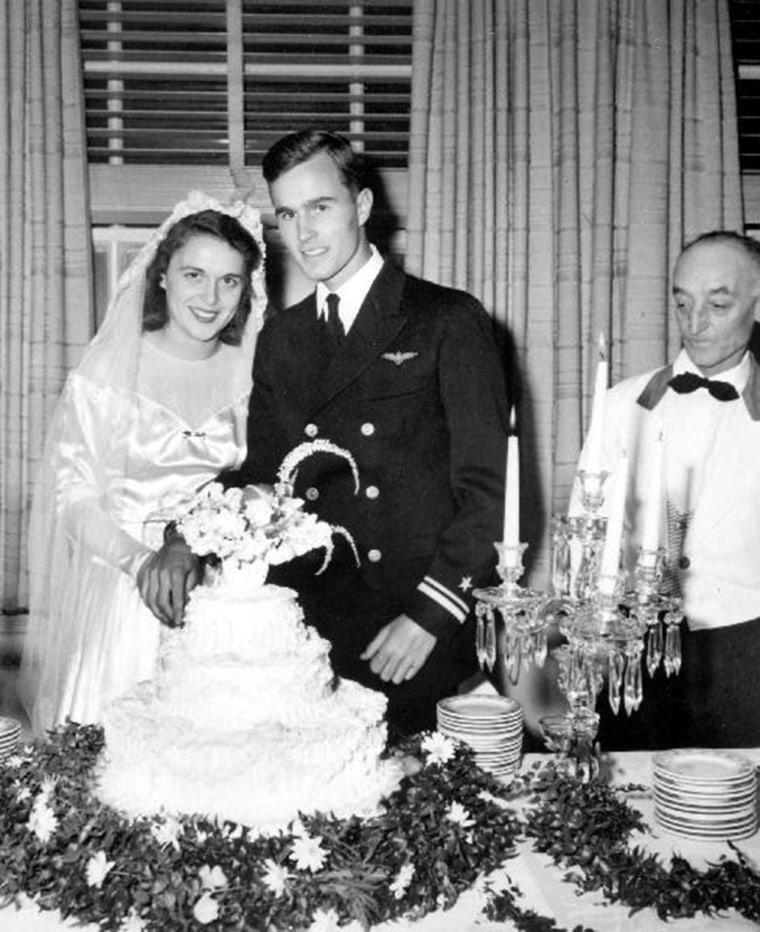 George and Barbara Bush cut their wedding cake, Rye, New York.