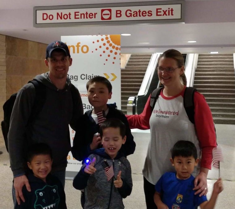 The Smith family returning home from their most recent trip to China in March 2018.