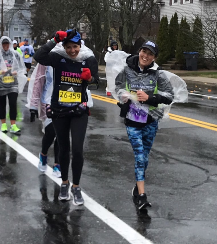 Shertenlieb with a friend just after mile 10 in the Boston Marathon.