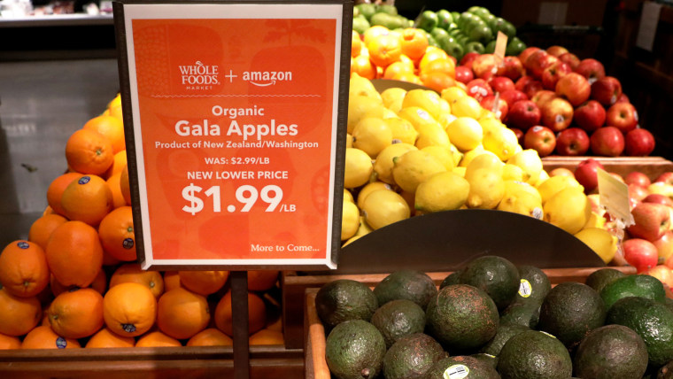 Image: Apples and Avocados are displayed at a Whole Foods store in New York