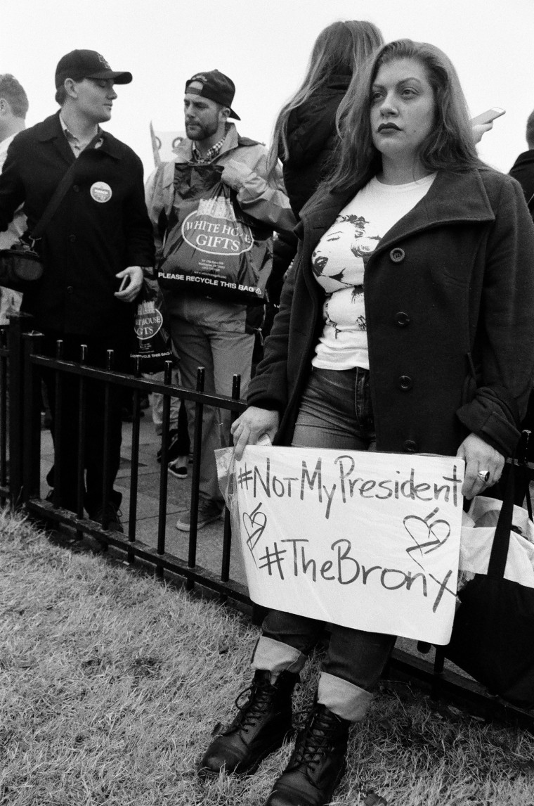 Image: Poet and South Bronx native Jani Rosado protests in front of the White House during the Women's March