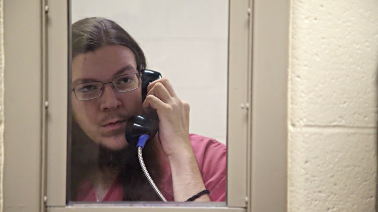 White nationalist and ShieldWall Network member Jacob Goodwin speaks with his parents while he was being held in the Lonoke County Jail in Lonoke, Arkansas. 