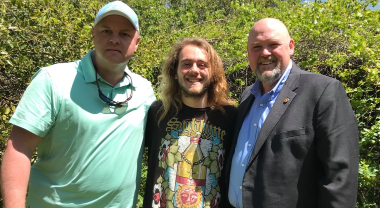 Lt. Michael Morris, Aubrey Carroll, and Sheriff Darrell Dix, from left to right, during their meeting on April 17, 2018.