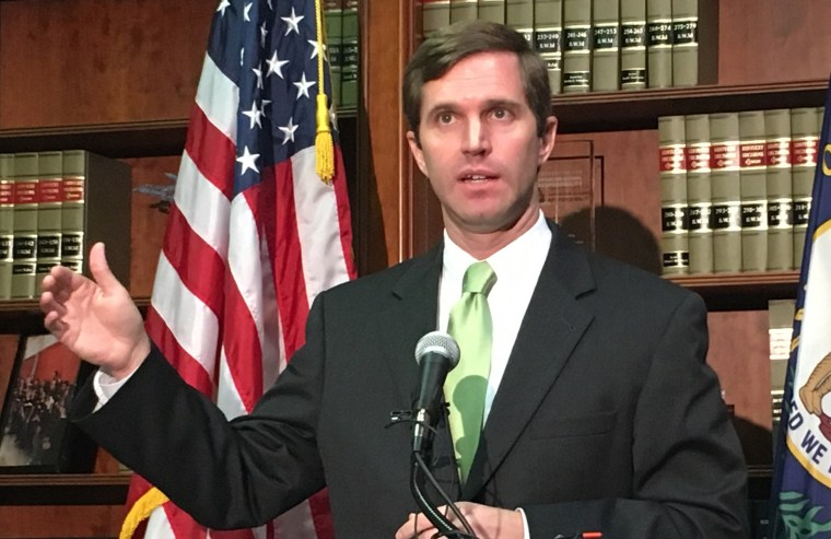 Image: Kentucky Attorney General Andy Beshear discusses a state Supreme Court ruling