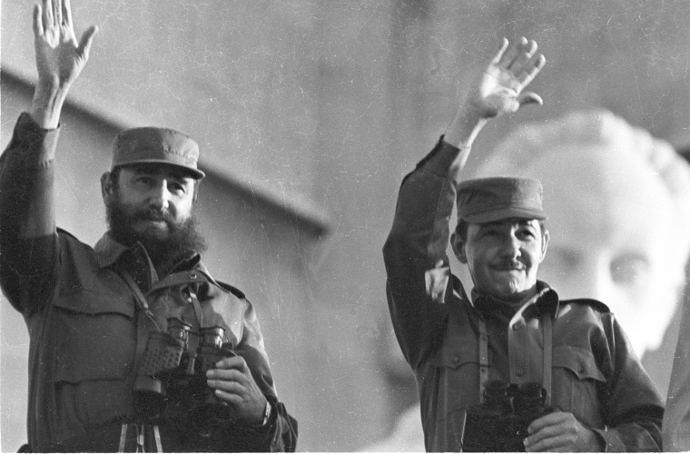Fidel Castro and his brother Raul wave during the annual May Day parade in Revolution Plaza in Havana, May 1, 1973.