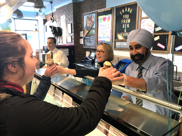 Image: Hoboken Mayor Ravi Bhalla hands out free ice cream cones at Ben &amp; Jerry's to raise money for the local homeless shelter.