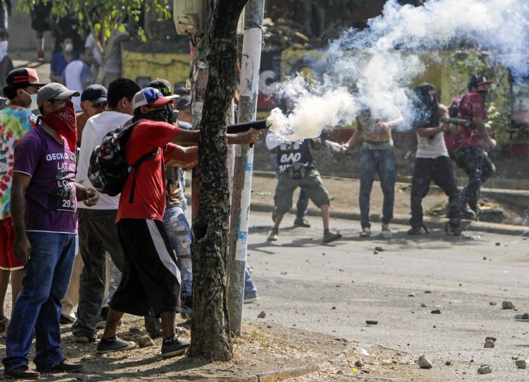 Image: Students clash with riot police agents close to Nicaragua's Technical College during protests in Managua