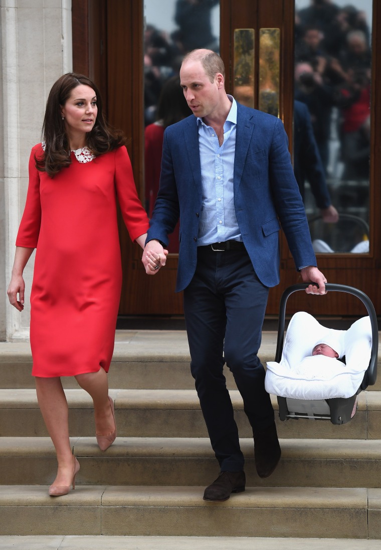 The parents looked calm and collected as they left the hospital with their new baby in tow. 
