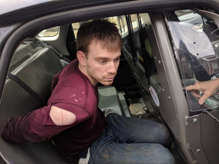Image: Travis Reinking apprehended in a wooded area in Nashville, Tennessee on Monday, April 23, 2018.