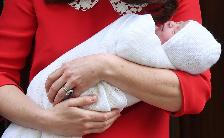 Image: The Duchess of Cambridge holds her newborn son