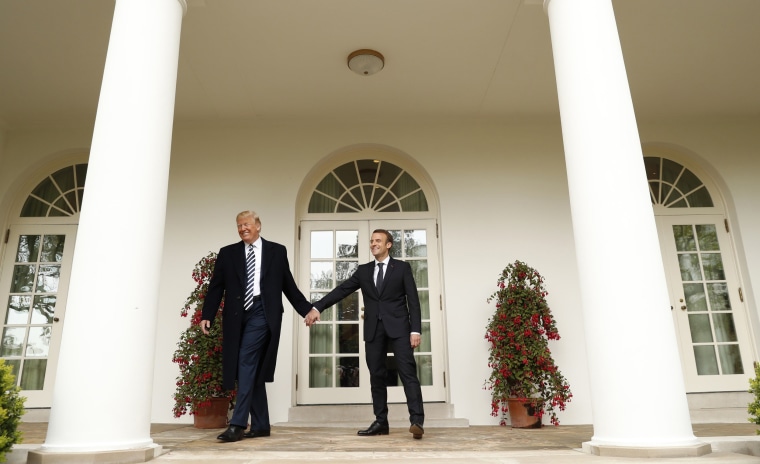 Image: U.S. President Trump welcomes French President Macron during arrival ceremony at the White House in Washington