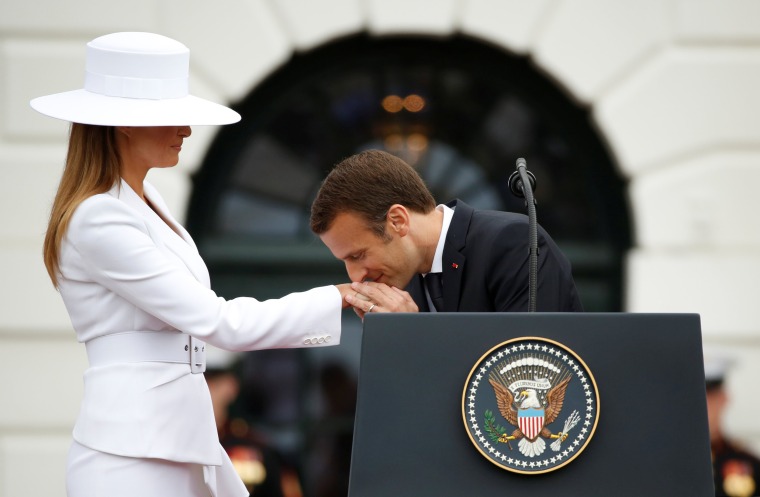 Image: U.S. President Donald Trump and first lady Melania Trump welcome French President Emmanuel Macron and his wife Brigitte Macron during an arrival ceremony at the White House in Washington