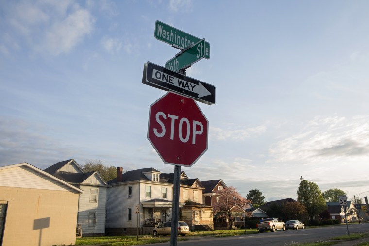 Image: Cars drive down a road known for prostitution, April. 26, 2018, in Huntington, West Virginia.