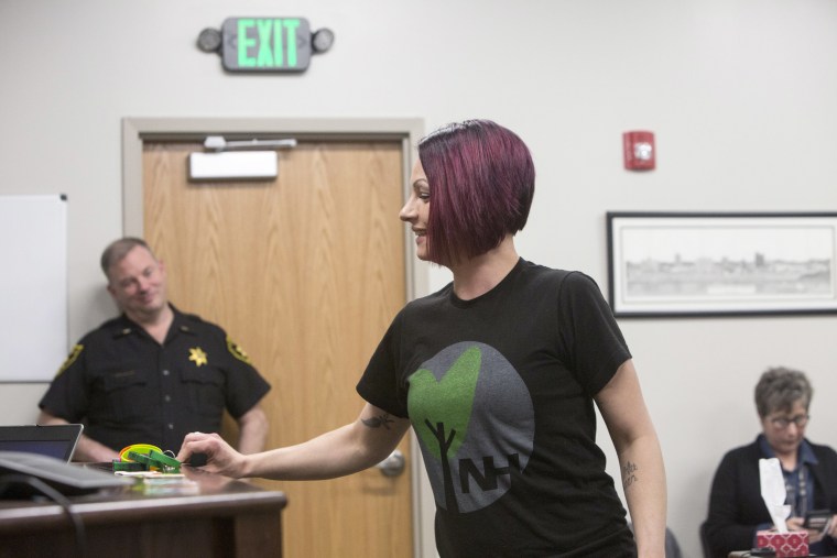 Image: Carly collects a reward for good behavior at the Cabell County Drug Court, April. 9, 2018, in Huntington, West Virginia.