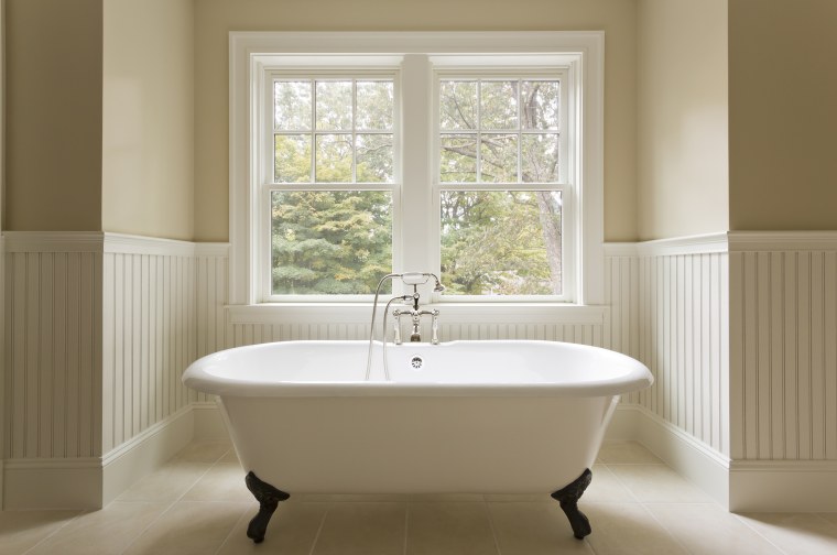 Clawfoot bathtub in custom designed bathroom.