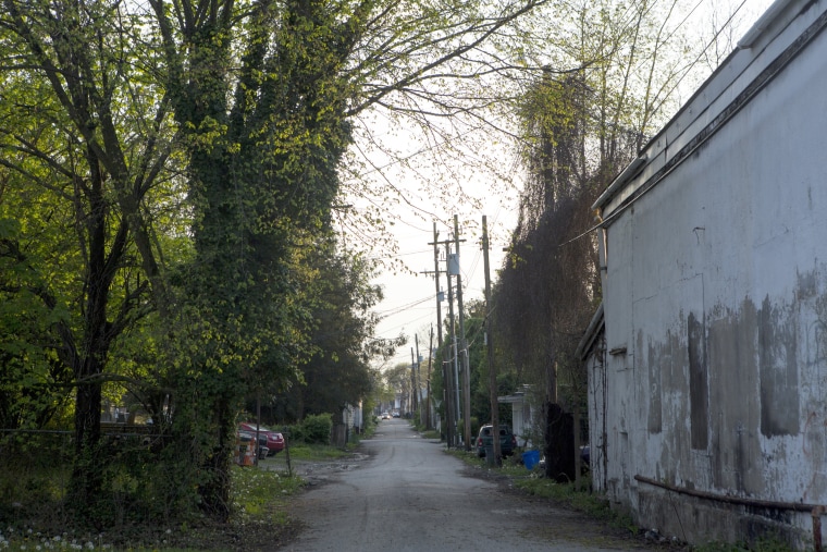 Image: A car drives down a alley near an area known for prostitution, April. 26, 2018, in Huntington, West Virginia.